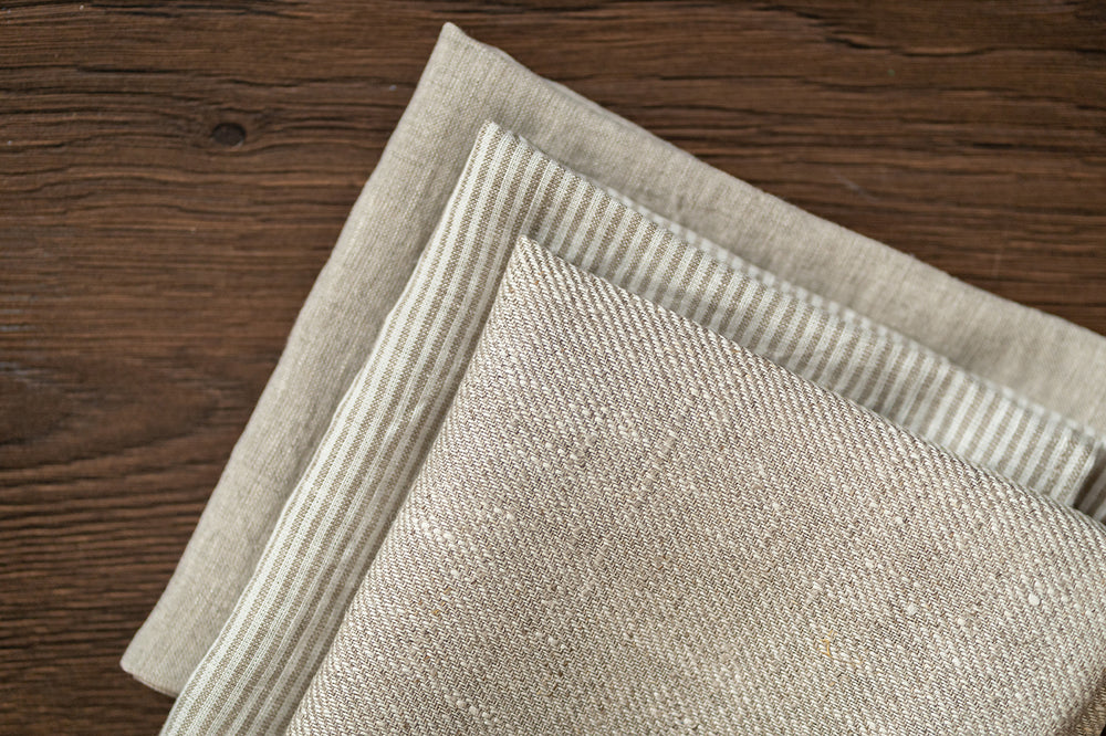 
                  
                    Load image into Gallery viewer, 3 beautiful linen tea towels in natural, striped and pale sandy colors
                  
                