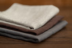 pale saandy, brown and grey linen tea towels
