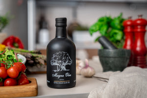 
                  
                    Load image into Gallery viewer, Magna Olea Extra Virgin Olive Oil 500ml bottle in the kitchen
                  
                